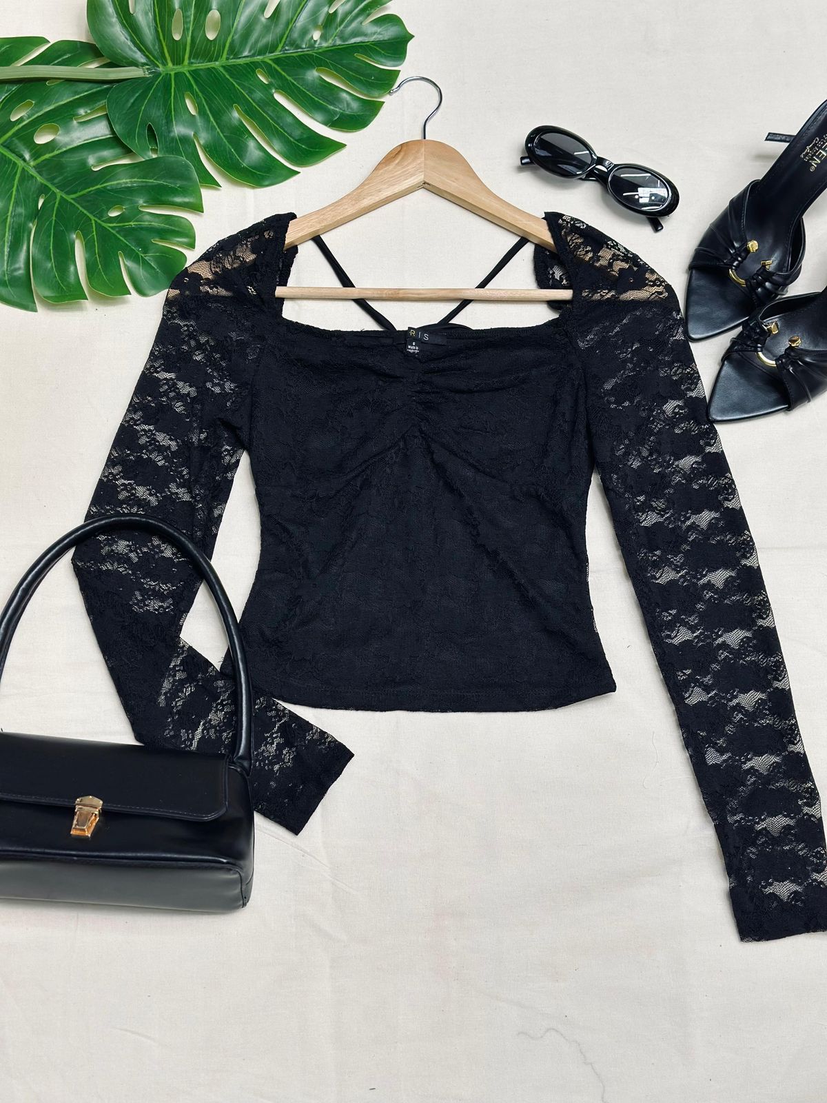 Blusa de encaje de manga larga