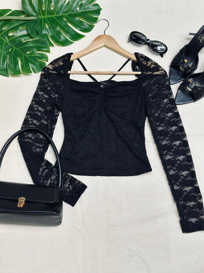 Blusa de encaje de manga larga